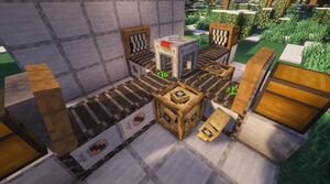 A Item Splitter is used here to split different seeds from the Item Filters placed on the left and right sides. Meanwhile, anything else (in this case regular Wheat Seeds) are coming out the front where the arrow points.